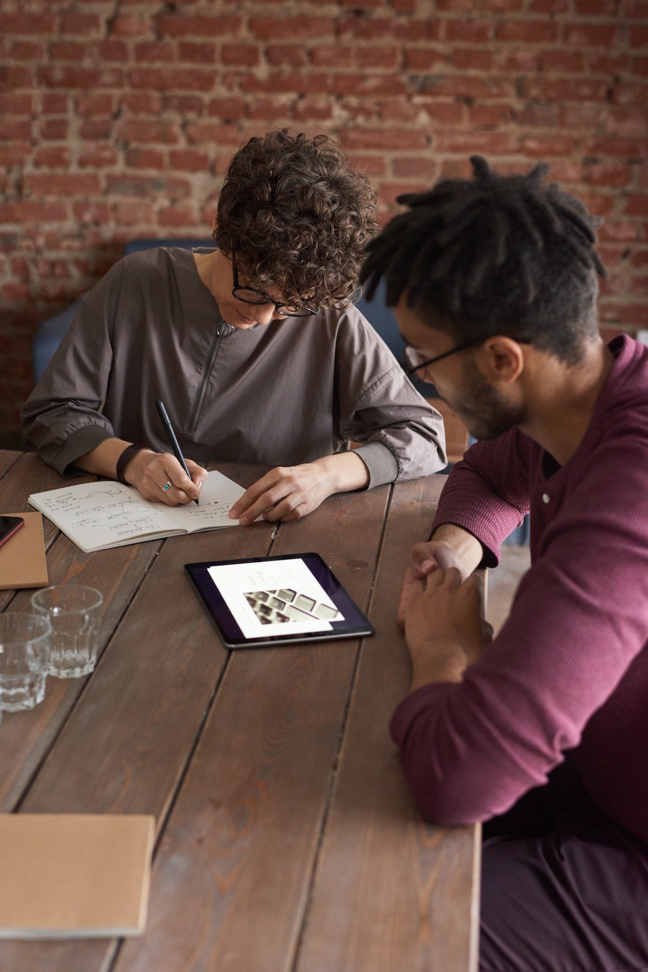 man-wearing-purple-long-sleeved-shirt-looking-at-the-ipad-3184326 man-wearing-purple-long-sleeved-shirt-looking-at-the-ipad-3184326